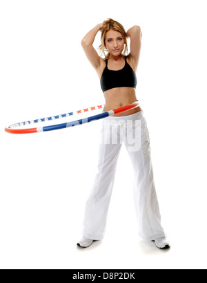 Full length young sporty girl doing exercise with hula hoop. Fitness woman isolated on white Stock Photo