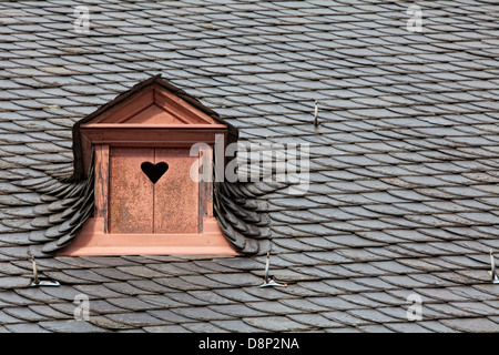 Dormer in a slate roof, shutters with heart, Germany, Europe, Stock Photo
