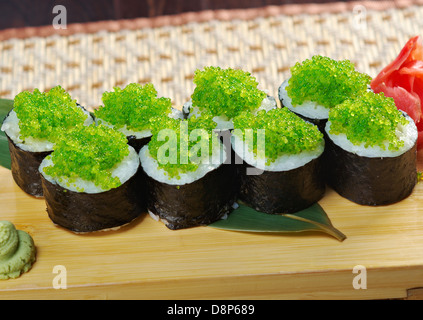 Tobiko (flying fish roe) Gunkan Maki Sushi.Roll made of Smoked fish Stock Photo