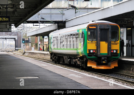 A local commuter train operated by London Midland Trains ready to depart Nuneaton station. Stock Photo