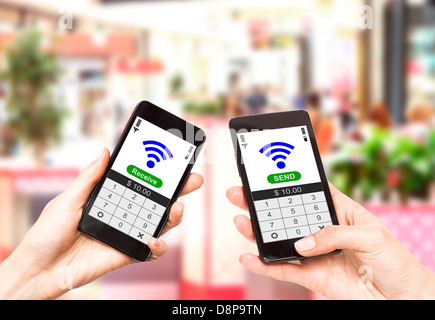 Two mobile phones with NFC payment technology. Near field communication Stock Photo