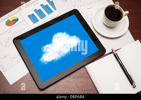Modern workplace with digital tablet showing cloud Stock Photo