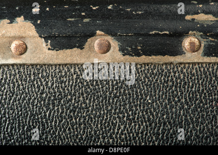 Rivets and leather parts from suitcase close up Stock Photo