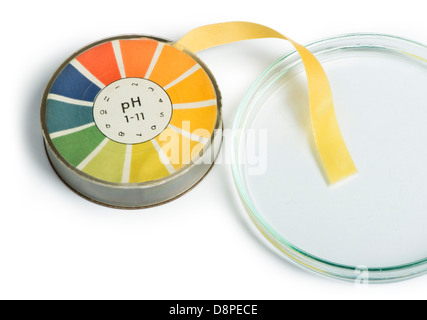 Litmus paper and beaker white isolated studio shot Stock Photo