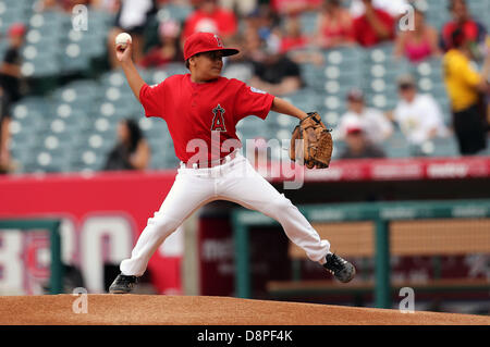 Anaheim, California, USA. 2nd June 2013. Little League pitcher throws the first pitch during Little League Day and the game between the Houston Astros and the Los Angeles Angels at Angel Stadium on June 2, 2013 in Anaheim, California. Rob Carmell/CSM/Alamy Live News Stock Photo