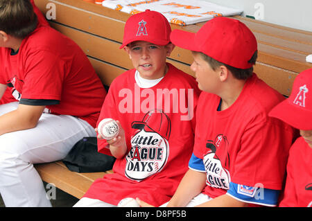 Anaheim, California, USA. 2nd June 2013. Little League player holds an autographed ball during Little League Day and the game between the Houston Astros and the Los Angeles Angels at Angel Stadium on June 2, 2013 in Anaheim, California. Rob Carmell/CSM/Alamy Live News Stock Photo