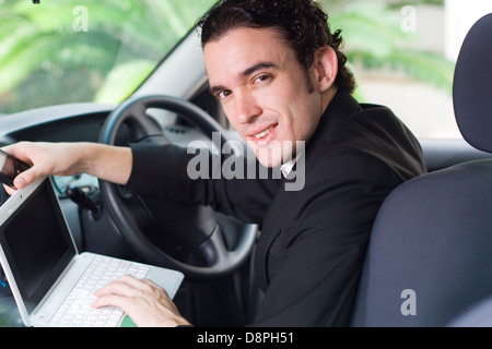young businessman working on the move Stock Photo