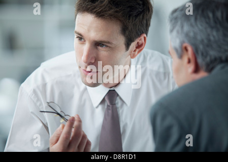 Businessmen discussing work Stock Photo