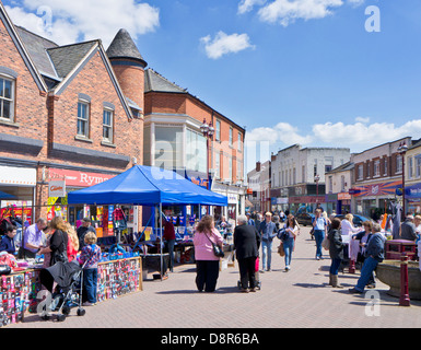 Busy Market place on Market day in Long Eaton Derbyshire England UK GB EU Europe Stock Photo