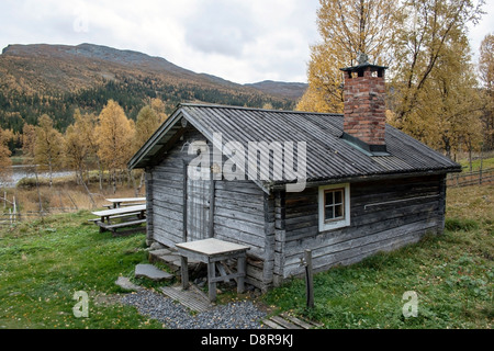 Old wooden cabin in mountain Stock Photo