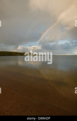 Rainbow over Whitefish lake in an area called The Barrenlands, Northwest Territories, Canada. Stock Photo