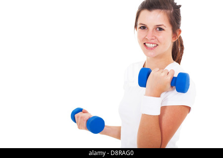 pretty teen girl exercising with dumbbells on white background Stock Photo