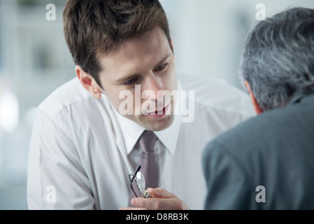 Businessmen discussing work Stock Photo