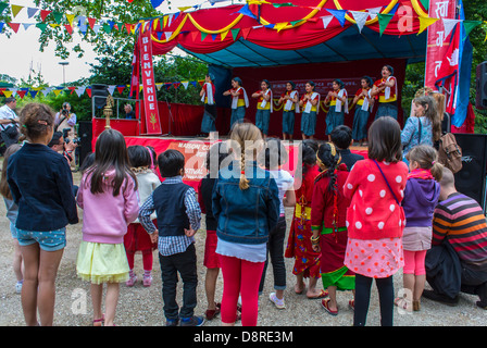 Paris, France, Audience, group standing from behind, Crowd Children at Himalayan Culture Festival in Tibetian Temple in Bois de VIncennes, celebrating different cultures Stock Photo