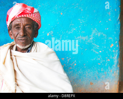 Elderly Ethiopian man sat in a roadside cafe near the Ethiopian Kenyan Border Stock Photo