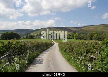 Rural lane road leading to Ollerbrook Booth, Edale, Peak District National Park, Derbyshire England UK, English countryside rural landscape Stock Photo