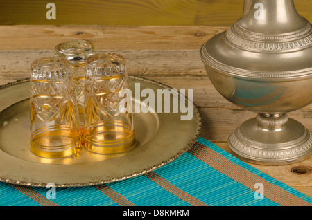 Old oriental tea accessories on a wooden table Stock Photo