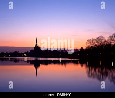 Lichfield cathedral reflected in Stowe Pool at sunset, Lichfield, Staffs, Staffordshire, England. UK, Western Europe. Stock Photo