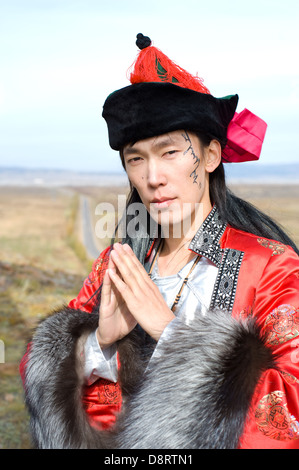 man in Mongolian costume Stock Photo