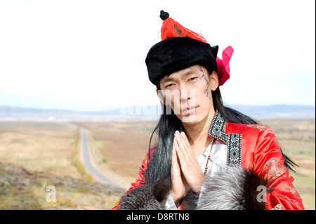 man in Mongolian costume Stock Photo