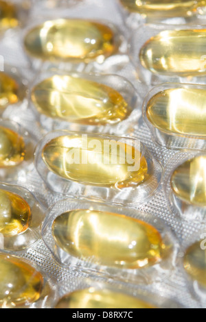 Garlic capsules (each containing 1000mg of garlic macerate, equivalent to 2400mg of fresh garlic) in a blister pack. UK, 2013. Stock Photo