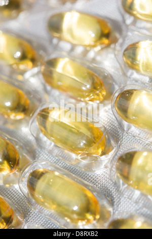 Garlic capsules (each containing 1000mg of garlic macerate, equivalent to 2400mg of fresh garlic) in a blister pack. UK, 2013. Stock Photo