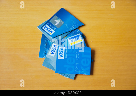 Discarded cut up debit and credt cards Stock Photo