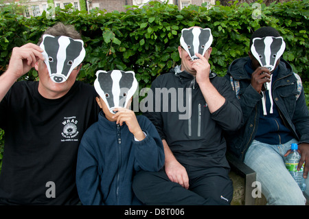 Protest against the proposed cull of badgers June 1st 2013, family all with badger masks Stock Photo