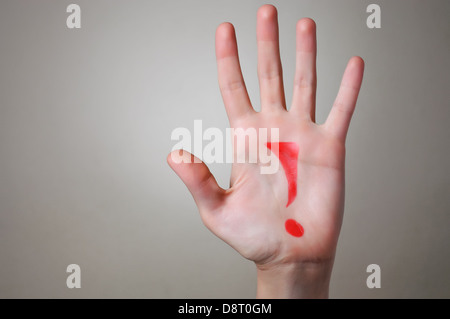 Red Exclamation Mark on a Hand Stock Photo