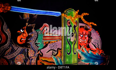 Brightly Painted Paper Lantern Floats on Parade at the Aomori Nebuta Festival, a summer festival that attracts a lot of tourists Stock Photo