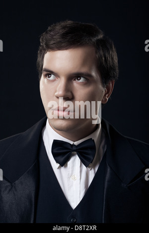 portrait of young man in tuxedo isolated Stock Photo