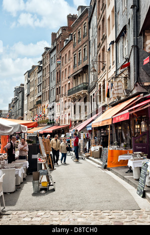 Restaurants and activity on the quayside at Honfleur, Calvados, Normandy Stock Photo