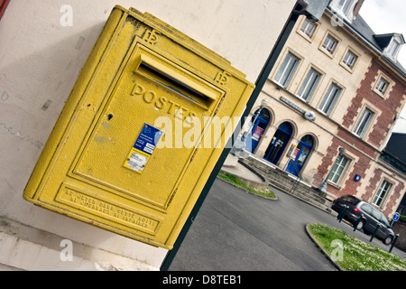 A typical French postbox on the wall outside a post office in Honfleur, Normandy, France Stock Photo