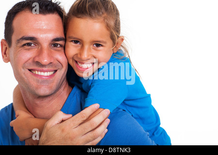 joyful father giving piggyback ride to his daughter against a white background Stock Photo