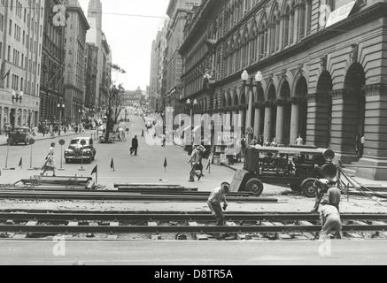 Laying down tram tracks Stock Photo