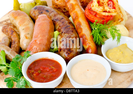 various sausages with sauces Stock Photo