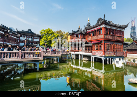 Shanghai, China - April 7, 2013: people outside of the oldest tea house of Fang Bang Zhong Lu at the old city of Shanghai in China on april 7th, 2013 Stock Photo