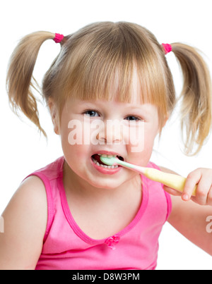 kid girl brushing teeth isolated Stock Photo