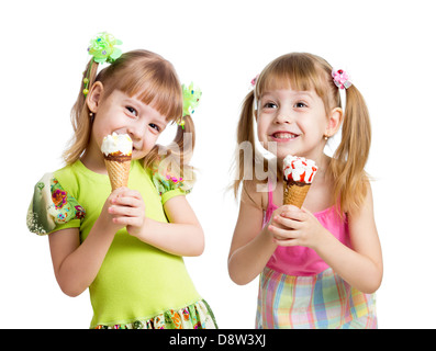 happy girls eating ice cream in studio isolated Stock Photo