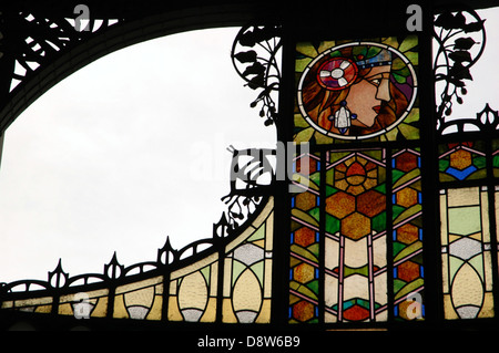 Art Nouveau stained glass decoration by Alfons also Alphonse Mucha at the main entrance to Obecni Dum Municipal House a civic building that houses Smetana Hall, a celebrated concert venue in Nove Mesto district in Prague Czech Republic Stock Photo