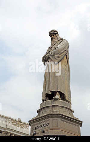 Statue of Leonardo Da Vinci standing in Piazza della Scala in Milan Italy Stock Photo