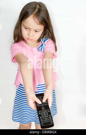 Asian child with remote control Stock Photo