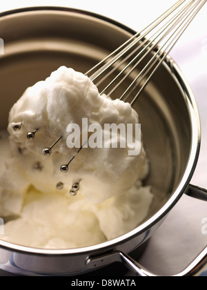 Beating egg whites Stock Photo