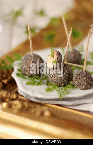 Foie gras balls coated with poppyseeds Stock Photo