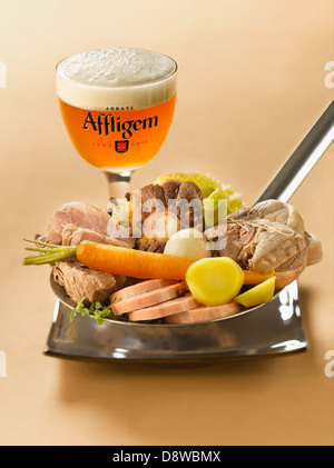 Hutspot Dutch, hochepot French or hotchpotch English, is a dish of boiled  and mashed potatoes, carrots and onions close up in the bowl on the table.  V Stock Photo - Alamy
