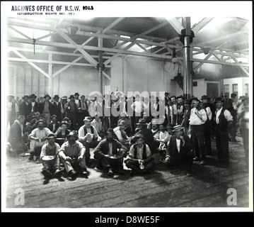 Interior of warehouse showing workers at lunch
