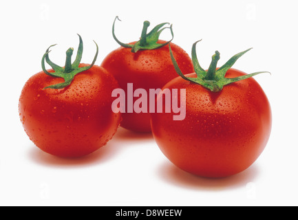 Three tomatoes Stock Photo