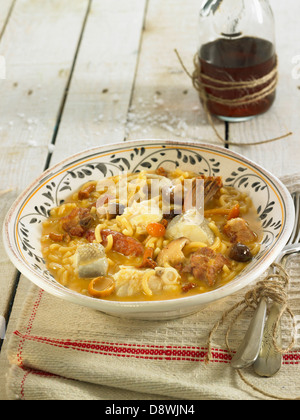 Fideos pasta with boletus mushrooms,pork,rabbit and salt-cod Stock Photo