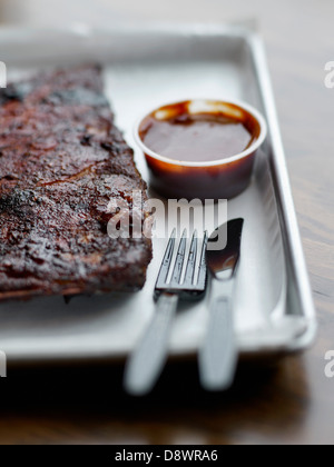 Smoked pork spare ribs from Smoque BBQ 's restaurant Stock Photo