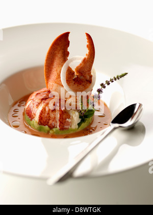 Lobster tail in sauce Stock Photo
